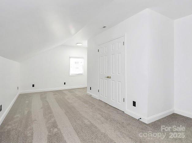 12300 Caldwell Rd, Charlotte, NC 28213 - bonus room with carpet and lofted ceiling