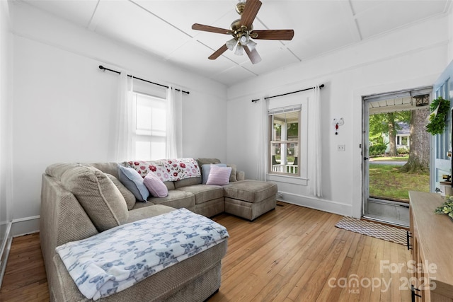 1008 Valley St, Kannapolis, NC 28081 - living room with light wood-type flooring, ceiling fan, and baseboards