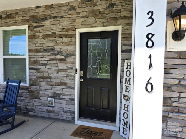 3816 Rosewood Dr, Mount Holly, NC 28120 - view of exterior entry with stone siding