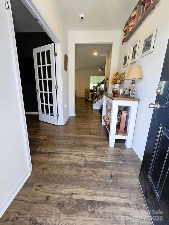 3816 Rosewood Dr, Mount Holly, NC 28120 - hall with wood finished floors, stairway, and baseboards