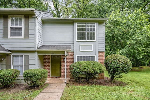 3941 Briarhill Dr, Charlotte, NC 28215 - view of front of home featuring a front lawn and brick siding