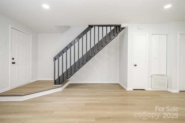 3941 Briarhill Dr, Charlotte, NC 28215 - foyer entrance with recessed lighting, baseboards, stairway, and wood finished floors