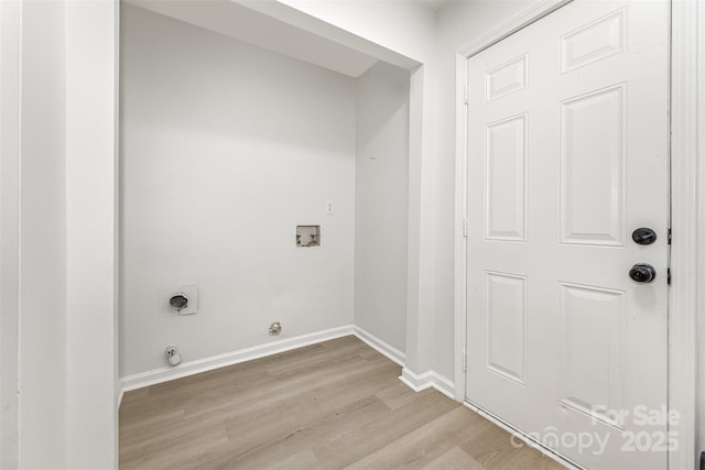 3941 Briarhill Dr, Charlotte, NC 28215 - laundry room with hookup for a gas dryer, light wood finished floors, baseboards, hookup for an electric dryer, and washer hookup