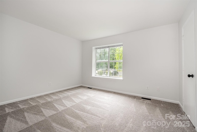 3941 Briarhill Dr, Charlotte, NC 28215 - carpeted empty room featuring baseboards