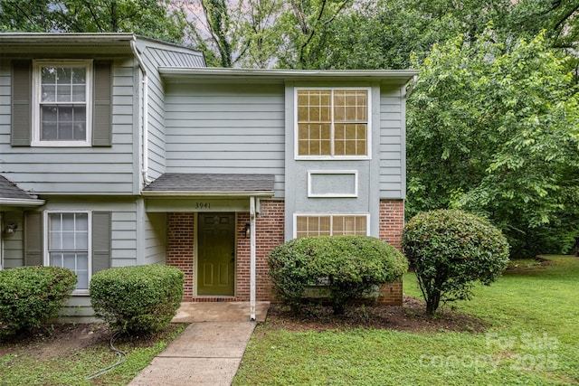 3941 Briarhill Dr, Charlotte, NC 28215 - view of front of house with a front lawn and brick siding