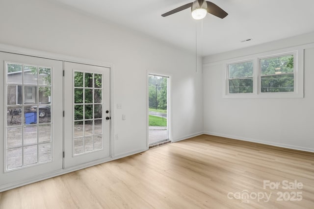 848 Ike Lynch Rd, Dallas, NC 28034 - empty room with plenty of natural light, light wood-style floors, and a ceiling fan