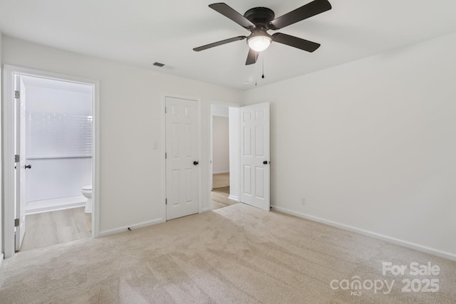 848 Ike Lynch Rd, Dallas, NC 28034 - unfurnished bedroom featuring carpet flooring, ensuite bath, and ceiling fan
