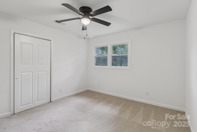848 Ike Lynch Rd, Dallas, NC 28034 - unfurnished bedroom with carpet, a closet, and ceiling fan
