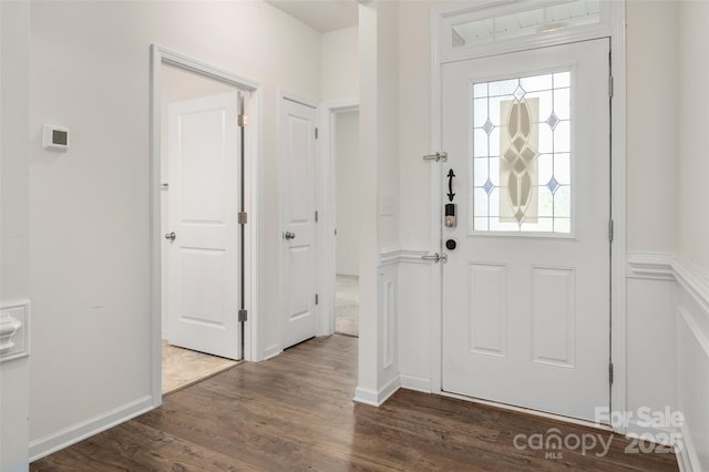 10410 Bradstreet Commons Way, Charlotte, NC 28215 - entrance foyer with dark wood-style floors and baseboards