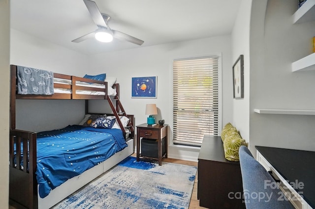 10043 Tepa Pl, Tega Cay, SC 29708 - bedroom with wood finished floors and ceiling fan