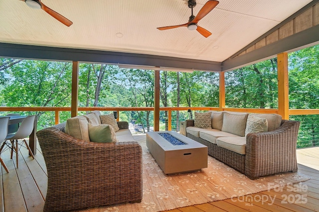 10043 Tepa Pl, Tega Cay, SC 29708 - sunroom / solarium featuring ceiling fan, an outdoor living space with a fire pit, and vaulted ceiling