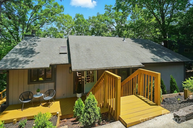 10043 Tepa Pl, Tega Cay, SC 29708 - back of property with a shingled roof and a deck