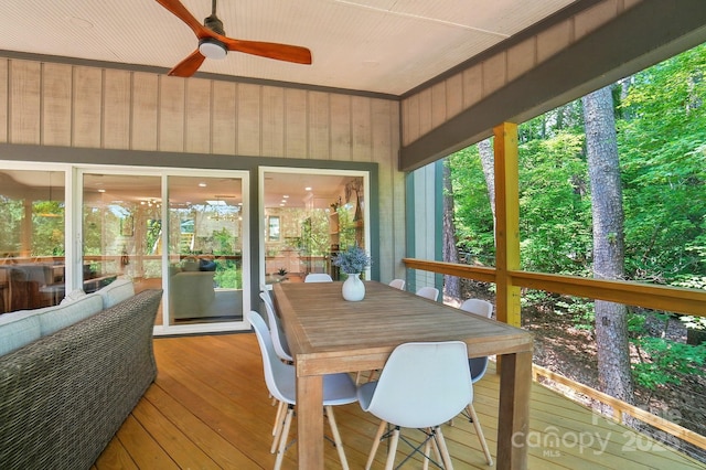 10043 Tepa Pl, Tega Cay, SC 29708 - sunroom featuring ceiling fan, hardwood / wood-style flooring, wood walls, and a wooden deck