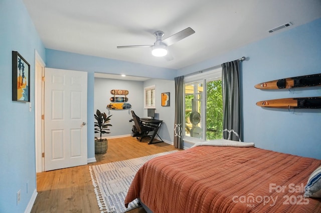 10043 Tepa Pl, Tega Cay, SC 29708 - bedroom with wood finished floors, baseboards, and ceiling fan