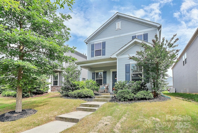 11733 Mesquite Rd, Huntersville, NC 28078 - view of front of house featuring a porch and a front lawn