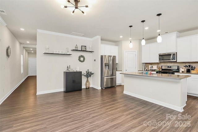 11733 Mesquite Rd, Huntersville, NC 28078 - kitchen featuring stainless steel appliances, dark wood-style floors, tasteful backsplash, recessed lighting, and white cabinetry