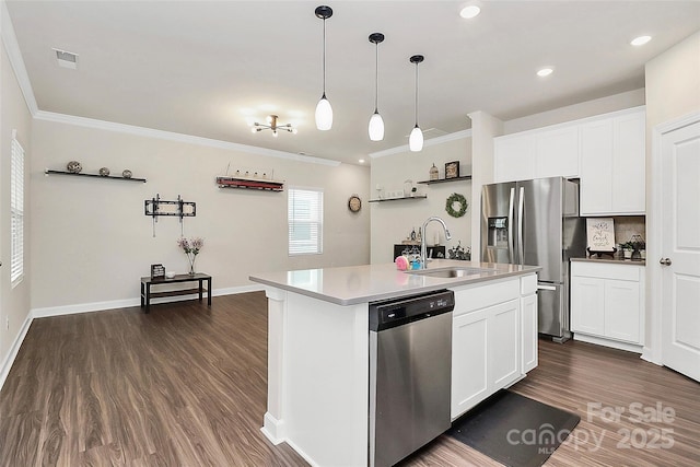 11733 Mesquite Rd, Huntersville, NC 28078 - kitchen featuring stainless steel appliances, a sink, ornamental molding, dark wood-style flooring, and decorative light fixtures