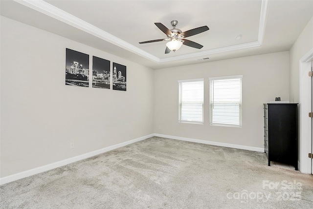 11733 Mesquite Rd, Huntersville, NC 28078 - carpeted empty room with a raised ceiling, a ceiling fan, crown molding, and baseboards