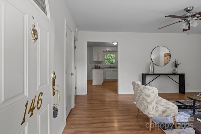 146 Duff St, Gastonia, NC 29715 - entryway featuring wood finished floors, ceiling fan, and baseboards