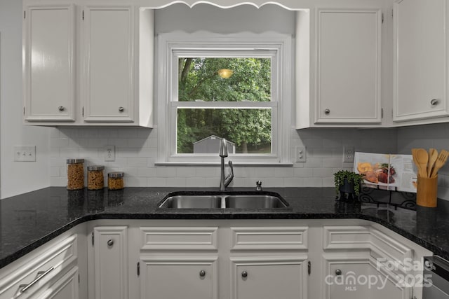 146 Duff St, Gastonia, NC 29715 - kitchen with a sink, white cabinets, and tasteful backsplash