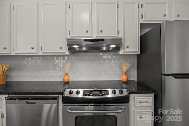 146 Duff St, Gastonia, NC 29715 - kitchen with appliances with stainless steel finishes, exhaust hood, white cabinets, tasteful backsplash, and dark stone counters