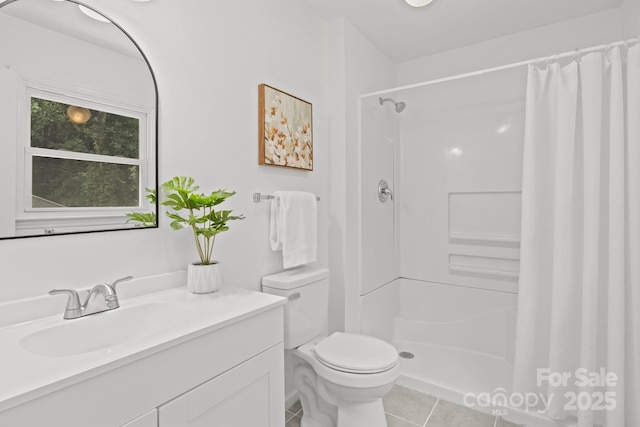 146 Duff St, Gastonia, NC 29715 - full bath featuring tile patterned floors, vanity, toilet, and a shower with shower curtain