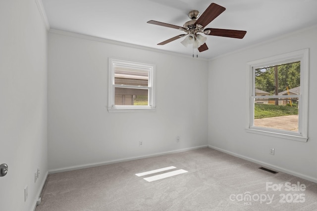 146 Duff St, Gastonia, NC 29715 - spare room featuring crown molding, light carpet, baseboards, and ceiling fan