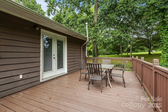 146 Duff St, Gastonia, NC 29715 - wooden terrace with outdoor dining area, french doors, and view of scattered trees