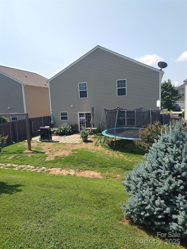 1818 Windy Willow Ln, Dallas, NC 28034 - back of property with a trampoline and a patio