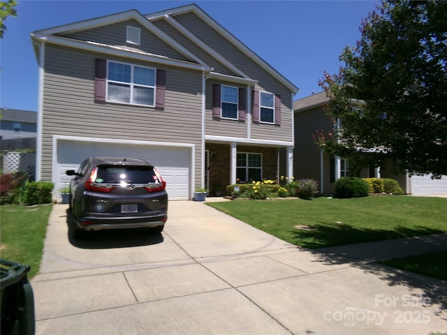 1818 Windy Willow Ln, Dallas, NC 28034 - view of front of home with concrete driveway, a garage, and a front yard