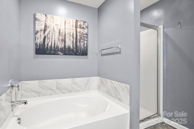 1398 Kent Downs Ave SW Unit 52, Concord, NC 28027 - bathroom with a garden tub and a stall shower