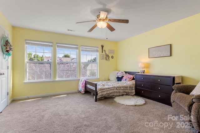 1398 Kent Downs Ave SW Unit 52, Concord, NC 28027 - carpeted bedroom with multiple windows, baseboards, and a ceiling fan