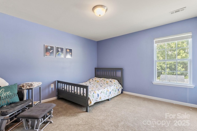 1398 Kent Downs Ave SW Unit 52, Concord, NC 28027 - carpeted bedroom featuring baseboards