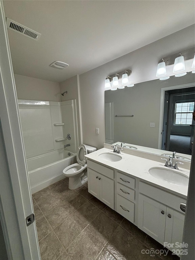 145 W Morehouse Ave, Mooresville, NC 28117 - bathroom with double vanity, shower / washtub combination, toilet, and tile patterned floors