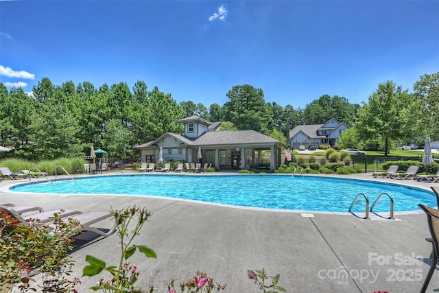 274 Cove Creek Loop, Mooresville, NC 28117 - community pool with a patio and view of scattered trees