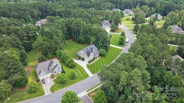 274 Cove Creek Loop, Mooresville, NC 28117 - aerial overview of property's location with a forest and nearby suburban area