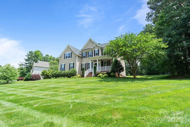 274 Cove Creek Loop, Mooresville, NC 28117 - view of front of property with covered porch, a front yard, and stairway