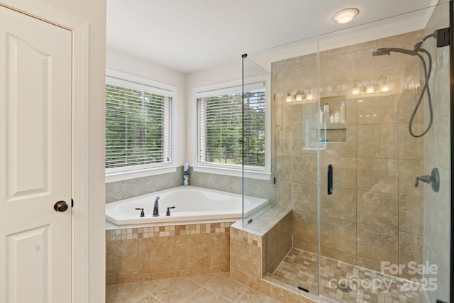 274 Cove Creek Loop, Mooresville, NC 28117 - full bathroom featuring a garden tub, a stall shower, and tile patterned flooring
