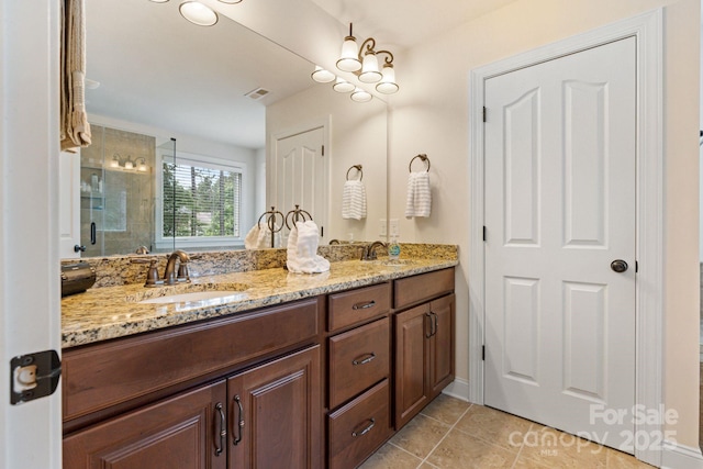 274 Cove Creek Loop, Mooresville, NC 28117 - bathroom featuring double vanity, a shower stall, and tile patterned floors