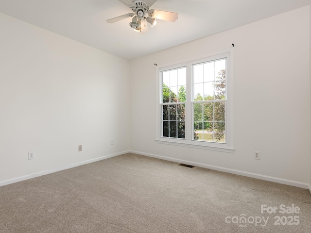 7006 Lone Eagle Dr # 18, Monroe, NC 28110 - carpeted spare room featuring baseboards and ceiling fan
