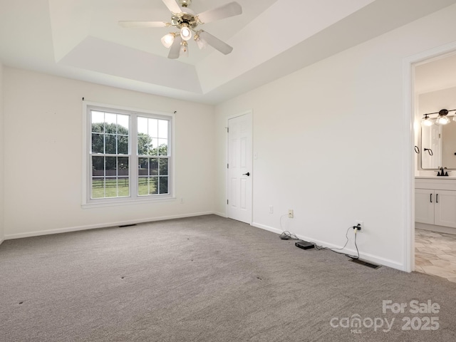 7006 Lone Eagle Dr # 18, Monroe, NC 28110 - carpeted spare room with a raised ceiling and ceiling fan