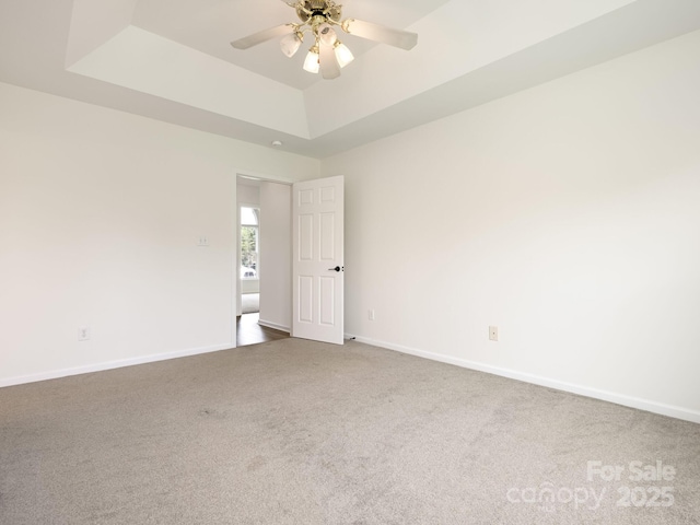7006 Lone Eagle Dr # 18, Monroe, NC 28110 - unfurnished room with carpet floors, a raised ceiling, and a ceiling fan