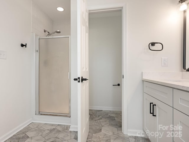 7006 Lone Eagle Dr # 18, Monroe, NC 28110 - full bathroom with vanity, a shower stall, and recessed lighting