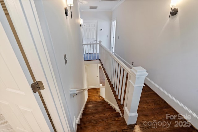 2223 Club Rd, Charlotte, NC 28205 - stairway with wood finished floors and crown molding
