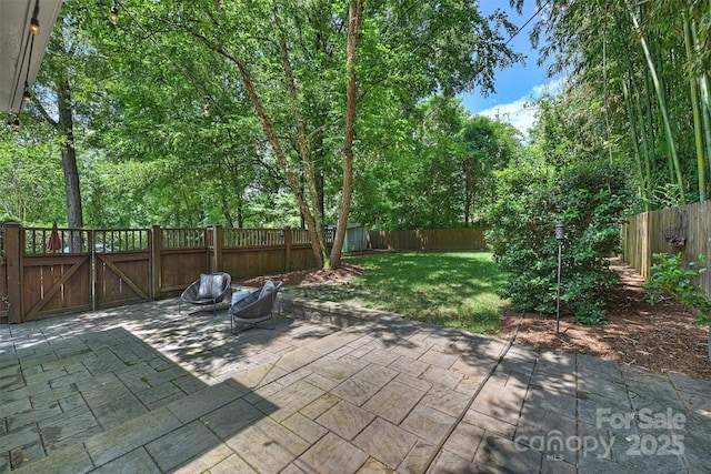 2223 Club Rd, Charlotte, NC 28205 - fenced backyard featuring a patio area