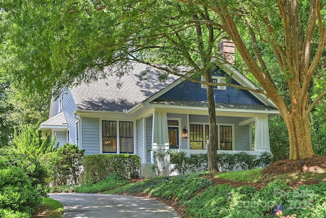 2223 Club Rd, Charlotte, NC 28205 - view of front of home featuring a chimney and roof with shingles