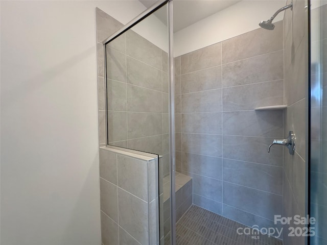 3618 S Tryon St Unit 19, Charlotte, NC 28217 - full bathroom featuring a tile shower