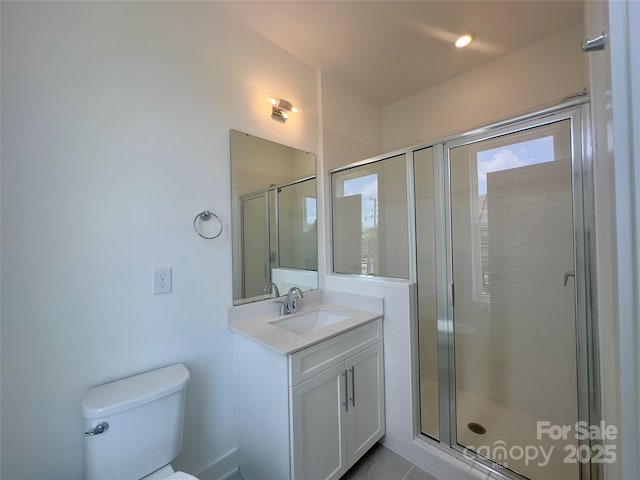 3618 S Tryon St Unit 19, Charlotte, NC 28217 - bathroom featuring toilet, vanity, and a stall shower