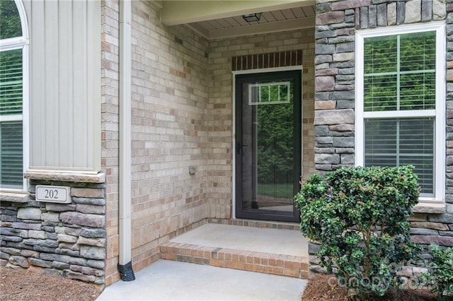 202 Watchtower Ct, Winston Salem, NC 27127 - doorway to property with brick siding and stone siding