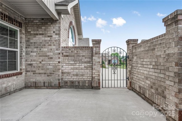 202 Watchtower Ct, Winston Salem, NC 27127 - view of patio with a gate